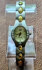Q&Q (by Citizen) Women’s Watch Two Tone Silver With Gold Accents Bracelet