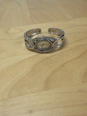 Women’s Quartz Oval Analog Bangle Watch 26mm Gem-Set Bezel Stainless Steel