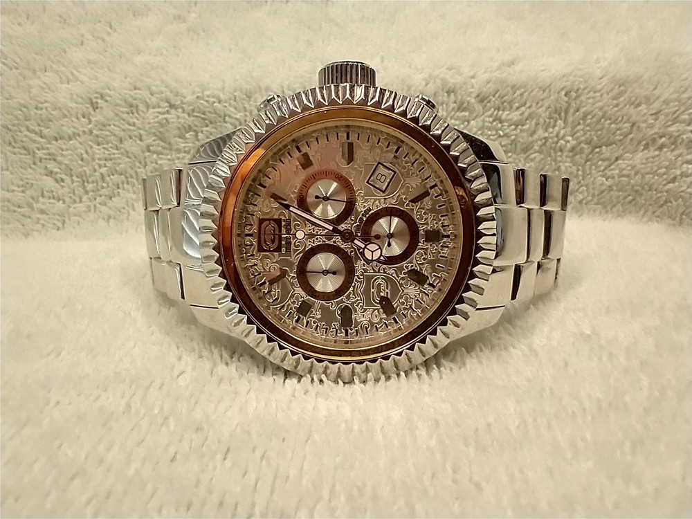 MARC ECKO MEN’S 2-TONE 3 SUB-DIAL CHRONO SILVER FACE/COPPER S/S BRACELET WATCH