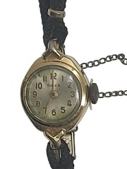Small Women’s Timex Watch Light Gold Face Gold Numbers Hands Black Cord Band