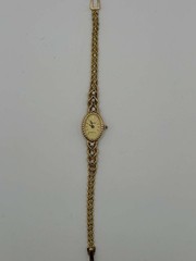 Geneve Quartz Women’s 14K Gold Oval Diamond Watch