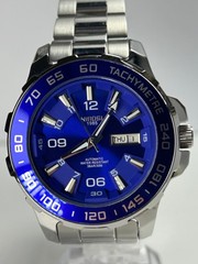 Nibosi NI2596 Mens Automatic 42MM Day/Date Silver Tone Blue Dial Exhibition Back