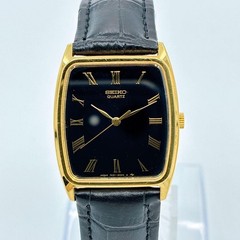 Made in 1995 SEIKO 7431 5390 black dial Roman slim tonneau