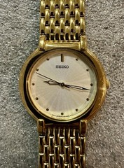 Vintage 1997 Seiko V701-1761 Gold Tone Dress Watch – Sunray Dial – Near Mint