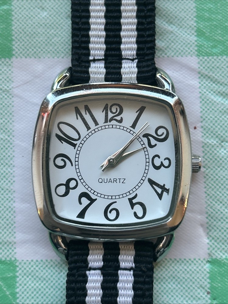 Women’s Silver Tone Black And White Band Quartz Watch