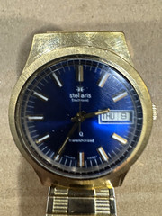 Stellaris Electronic Blue Sunburst Dial Day/Date Gold Bracelet 36mm case