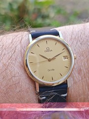 Omega DeVille Quartz 196.2432 Date Mens Model Solid Gold Bezel Circa 1996