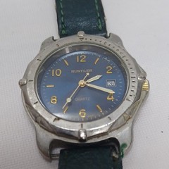 Rustler Quartz Analog Wristwatch Blue Dial Date Silver Case Green Leather Strap