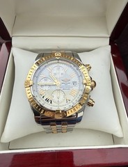 BREITLING C13356 ROSE GOLD AND STEEL CHRONOMAT EVOLUTION CHRONOGRAPH.