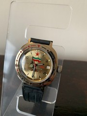 VOSTOK KOMANDIRSKIE 1945-1995 WITH CALENDAR WRISTWATCH. NEW OLD STOCK.