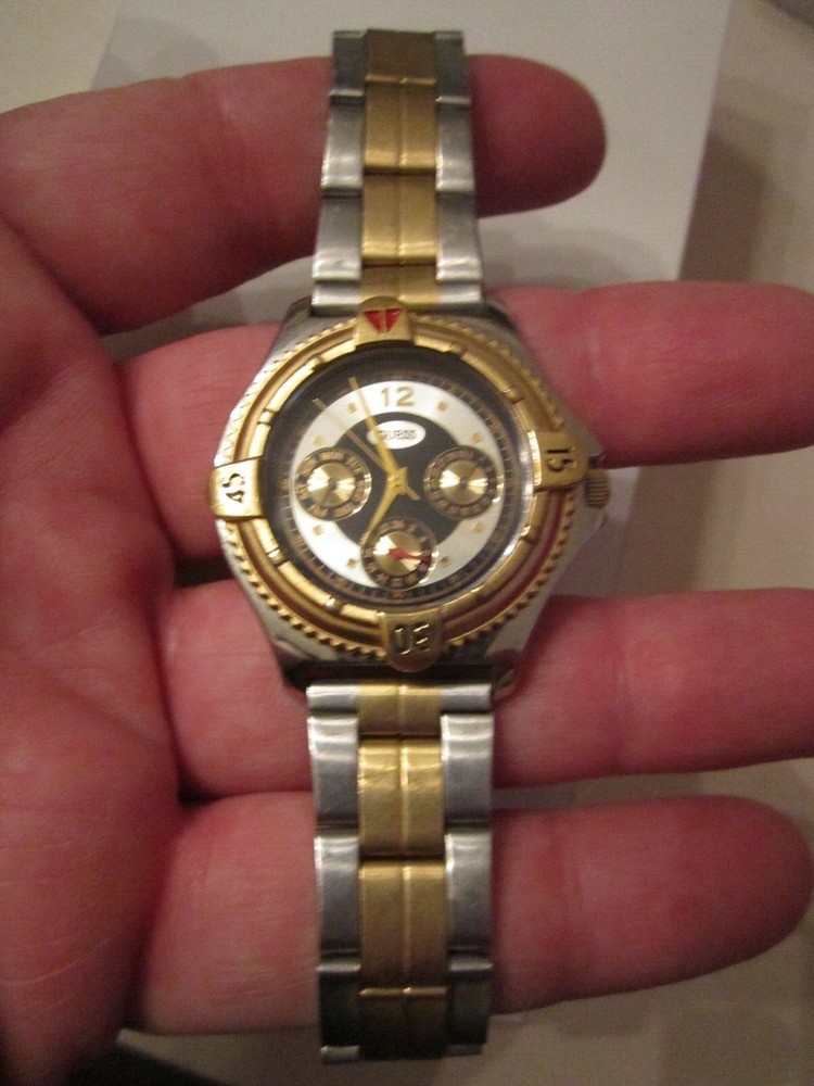 VINTAGE GUESS WATCH HEAVY CASE BEZEL- QUARTZ – RUNS GREAT – BBA-27
