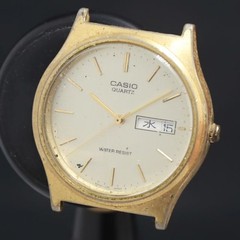 CASIO MQ-514 Gold Dial Day Date Women’s Watch