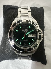 TOURNEAU,Watch Gear,day/date, rotating Bezel,32mm,WR100M,St/Steel ladies