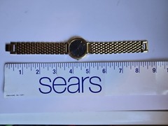 Seiko Men’s V701-1861 Goldtone Black Dial Watch