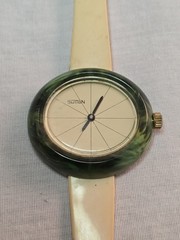vintage 1970s Sutton Swiss-made manual-wind watch with a green marbled…