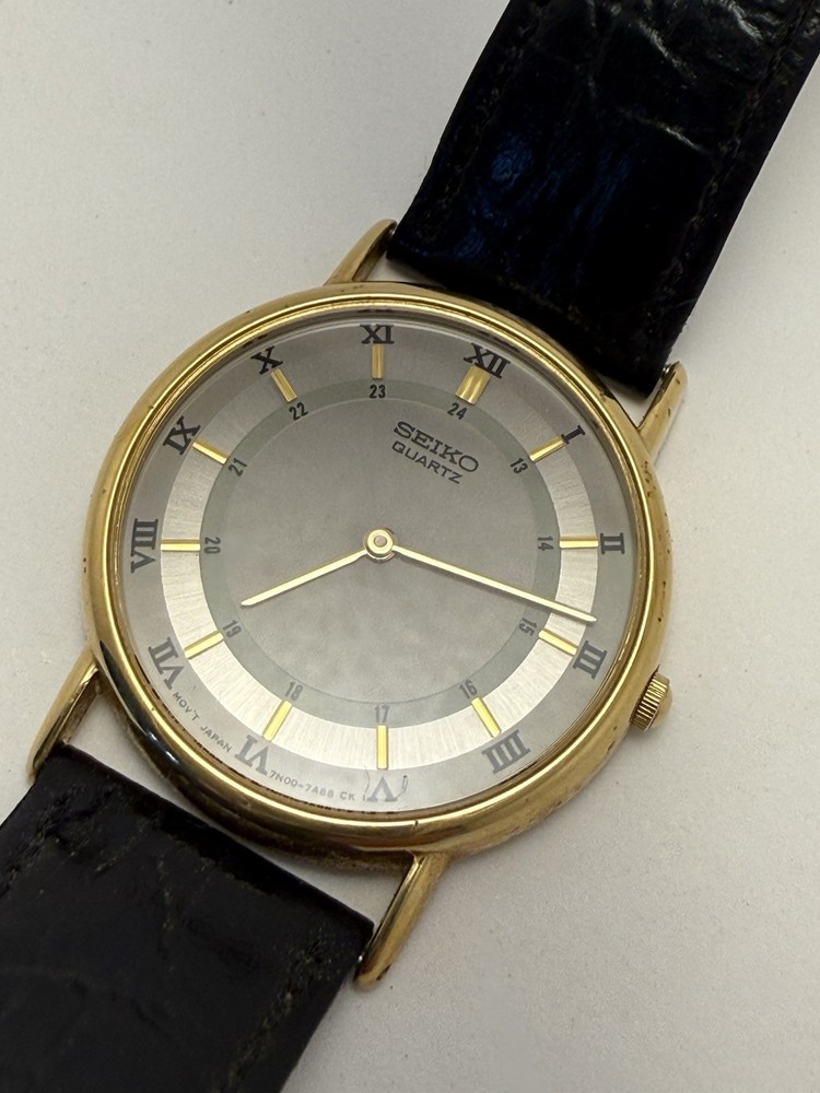 Seiko Quartz Men’s Dress Watch Gold Case Silver Roman Dial Black Leather 30mm