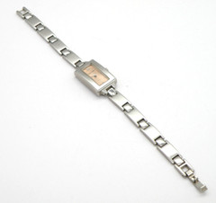 Oleg Cassini womens watch Silver tone bezel copper tone face 7.5″ band Used
