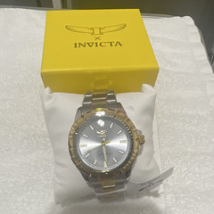 Invicta Men’s Analog Two-Tone Steel Bracelet Silver Dial Stick Indexes Box