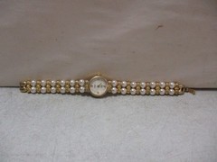 Avon Womens Gold Tone Pearl Bracelet Watch