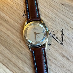 Universal Geneve, Polerouter Date, gold plated, 35mm case strap cream dial