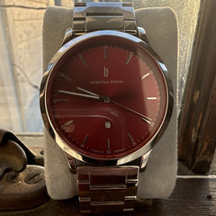 Lilienthal Berlin Quartz 40mm Red Dial Date Steel Bracelet 5 ATM
