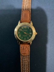 LA GEAR Ladies Watch gold tone with brown leather band . this is a used watch .