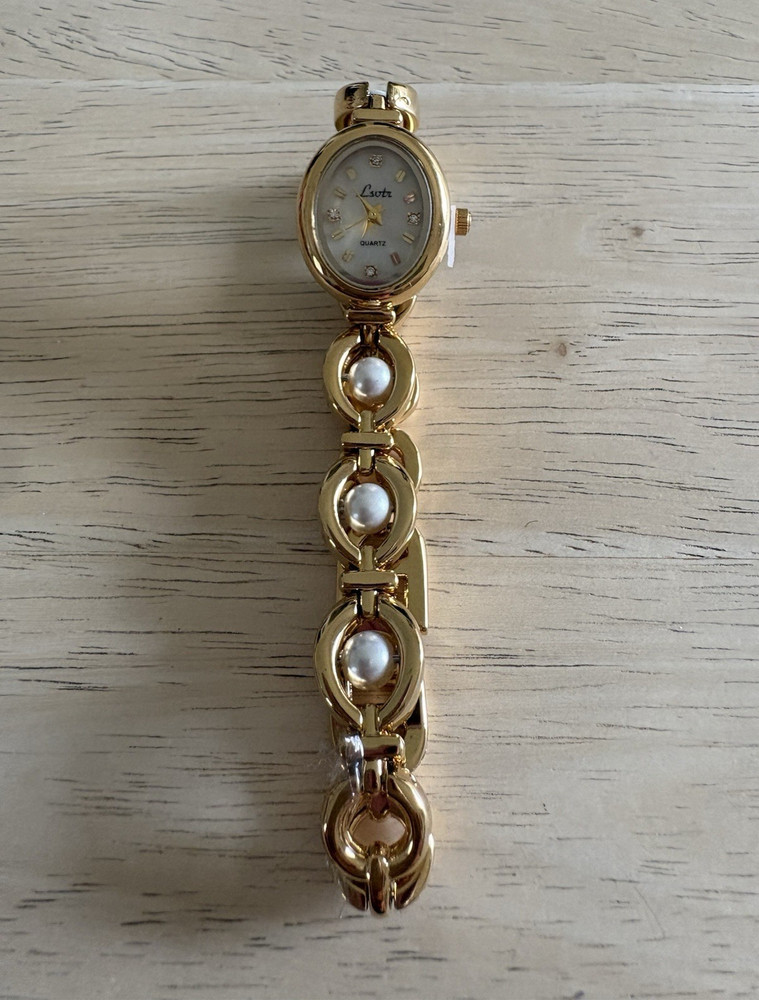 Lsotr Women’s Quartz Oval Dress Watch Gold Tone Faux Pearl Bracelet White Dial