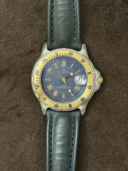Burett B1520CD Quartz Watch Blue Dial Roman Numerals Date Gold Bezel 100m