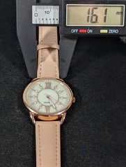 Womans White Crystal Accent MOP Dial Round Rose Gold Tone Case Pink Band Watch