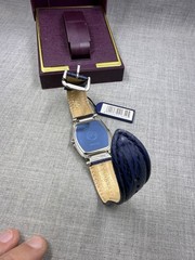 Seiko SQ 100 Blue Wave Pattern Blue Leather Date Quartz 37mm Watch 7N42-5000