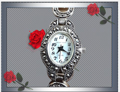 Vintage Jaclyn Smith Watch, silver-tone and simulated marcasite and black stones