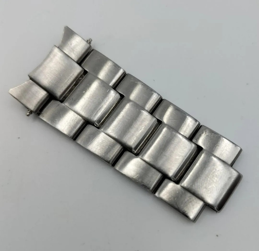 Used watch parts: Citizen Alterna H500-S064538 end piece, flash fit, strap band.