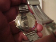 VINTAGE GUESS WATCH HEAVY CASE BEZEL- QUARTZ – RUNS GREAT – BBA-27