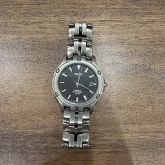 38.6mm.Mans Quartz SEIKO Titanium 50M for parts needs battery?
