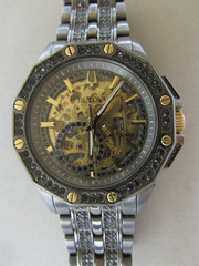 Bulova 98A293 Octava Automatic Gunmetal/Gold Skeleton Dial Men’s SS Watch