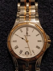 Cyma le Locle Men’s Sapphire Crystal Watch. Stainless Steel And 18k Gold Bezel