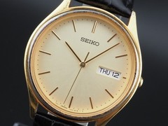 Vintage 1995 Seiko 7N43-8A90 Gold Day Date Quartz Mens Watch JAPAN