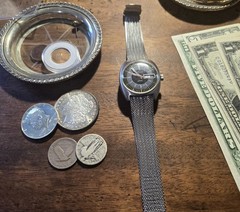 Caravelle Automatic Men’s Day/Date Black Dial Silver Case Mesh Bracelet Watch