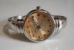 WOMEN’S SILVER FINISH GOLD, SILVER & RED DIAL BANGLE CUFF FASHION CASUAL WATCH