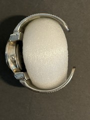 embassy quartz watch hammered cuff style round silver and gold tone