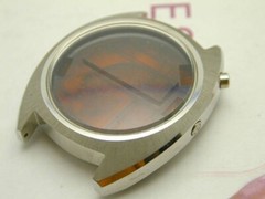 NOS VINTAGE 1976 BULOVA RED CRYSTAL ALL STAINLESS STEEL WATCH CASE AS PICTURED.