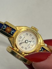 Swiss made blue green red enamel flower peekaboo watch bracelet gold tone