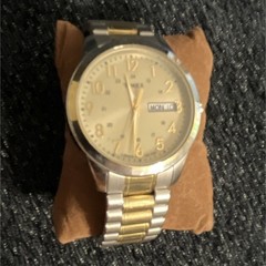 Timex Men’s Quartz Day/Date Silver Dial Arabic Two-Tone Steel Bracelet Watch