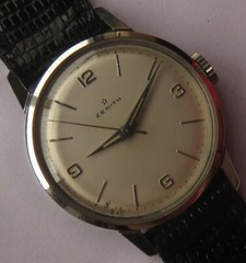 Zenith mens wristwatch load manual steel case screw cap 33 mm. in diameter