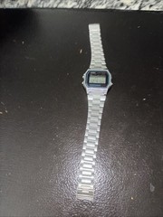 Vintage Casio A158WA-1 digital watch features a classic square face
