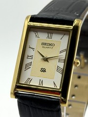 Vintage Refurbished Seiko Rectangular White Dial Black Faux Leather Strap