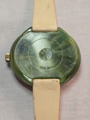 vintage 1970s Sutton Swiss-made manual-wind watch with a green marbled…