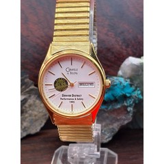 Vintage 1995 Caravelle by Bulova gold-tone watch awarded for the Denver Dist.
