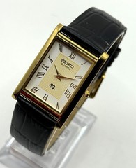 Vintage Refurbished Seiko Rectangular White Dial Black Faux Leather Strap