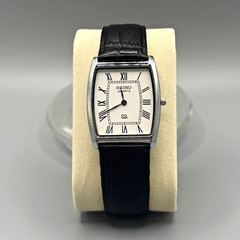 Seiko Quartz Vintage Dress Tonneau Silver Case White Roman Dial Black Leather